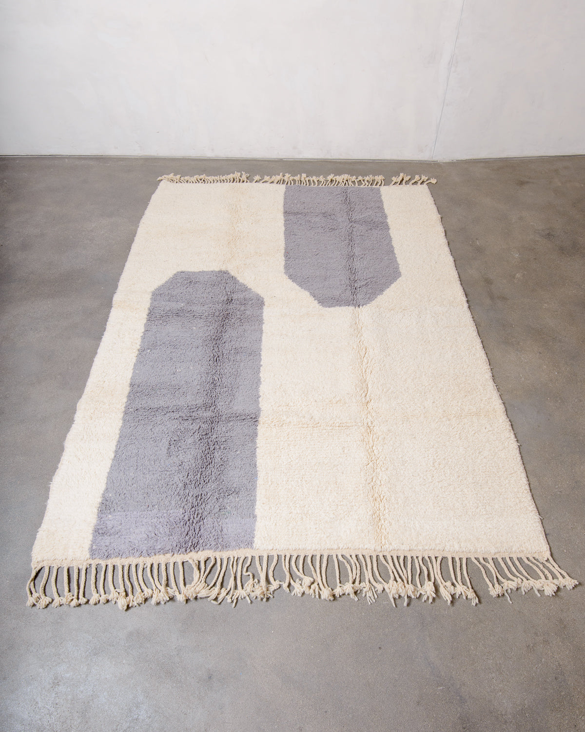 Modern, designer, handcrafted Berber rug from Morocco. Beniourain carpet with beautiful colours and patterns and fluffy wool texture.